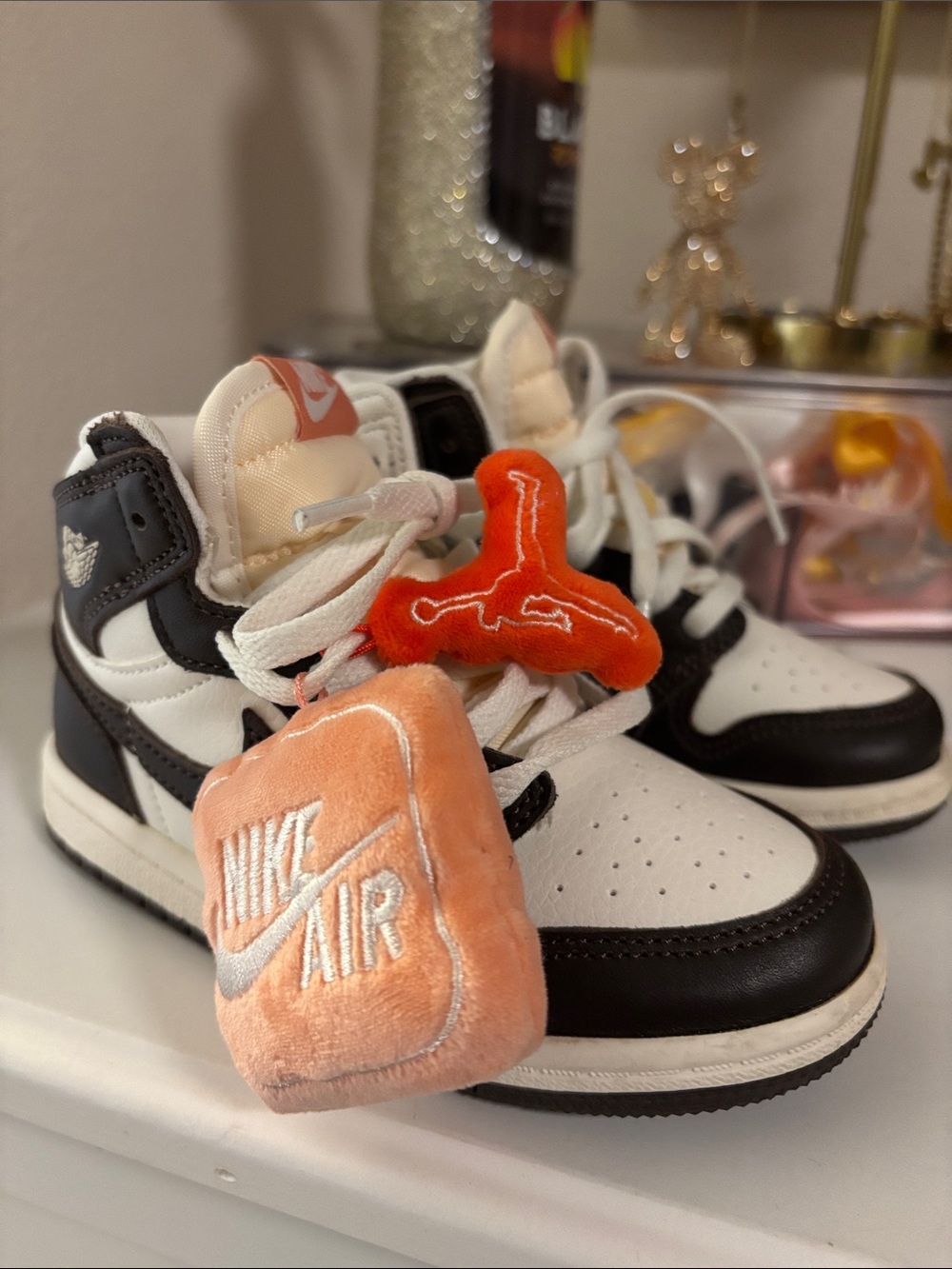Nike Kids Black and White High-Top Sneakers with Peach Accents